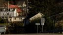 A sign greets drivers to Bolivar, Pennsylvania, with local homes in the background. It is the home of FAVOR ~ Western PA, which provides syringe services.