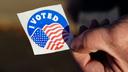 A voter holds an “I Voted” sticker Nov. 8, 2022, at Memorial Hall in Jim Thorpe Carbon County, Pennsylvania.
