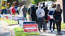 Voters outside a polling place.