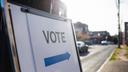 A sign showing people where they should cast their ballots for an election.