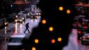 Pedestrians cross South Broad Street in Philadelphia during a rainy winter storm in October of 2022.