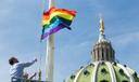 The LGBT flag flies at the Capitol building in Harrisburg.