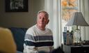 Election worker John "Jay" Schneider, 76, sits for a portrait at his Downingtown Pa. home on Monday, October 30, 2023.