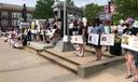 The 3/20 Coalition protests against police violence at the Centre County Government building.