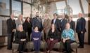 Some trustees of the Pennsylvania public school pension system, PSERS, pose with executive director Glen Grell (right) at the $60 billion-asset agency's Harrisburg office tower in 2020. Chairman Chris Santa Maria, a Harriton High School social studies teacher, is at center.