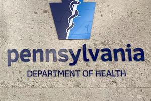 Pennsylvania Department of Health logo on the outside of its main building.