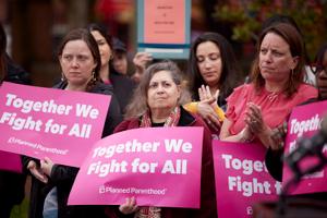 Public officials and members of Planned Parenthood at a 2022 press conference about the overturning of Roe v. Wade.