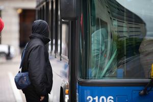 People catch a bus in Harrisburg during a commemoration of Rider Appreciation Days.