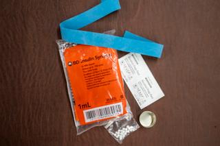 Syringes, alcohol swabs, and other supplies sit on a table in Western Pennsylvania.